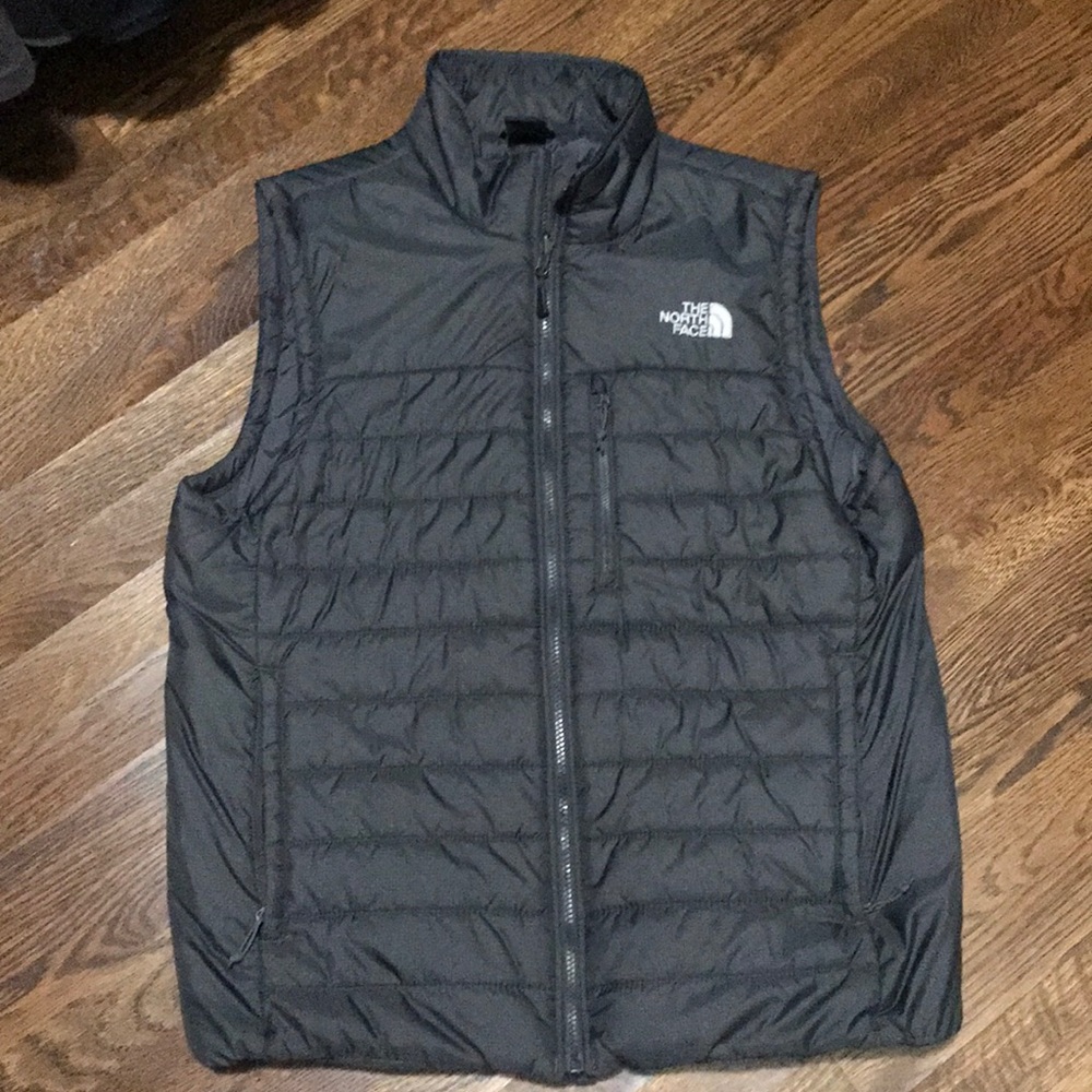 The North Face men’s puffer vest. Like new. Large